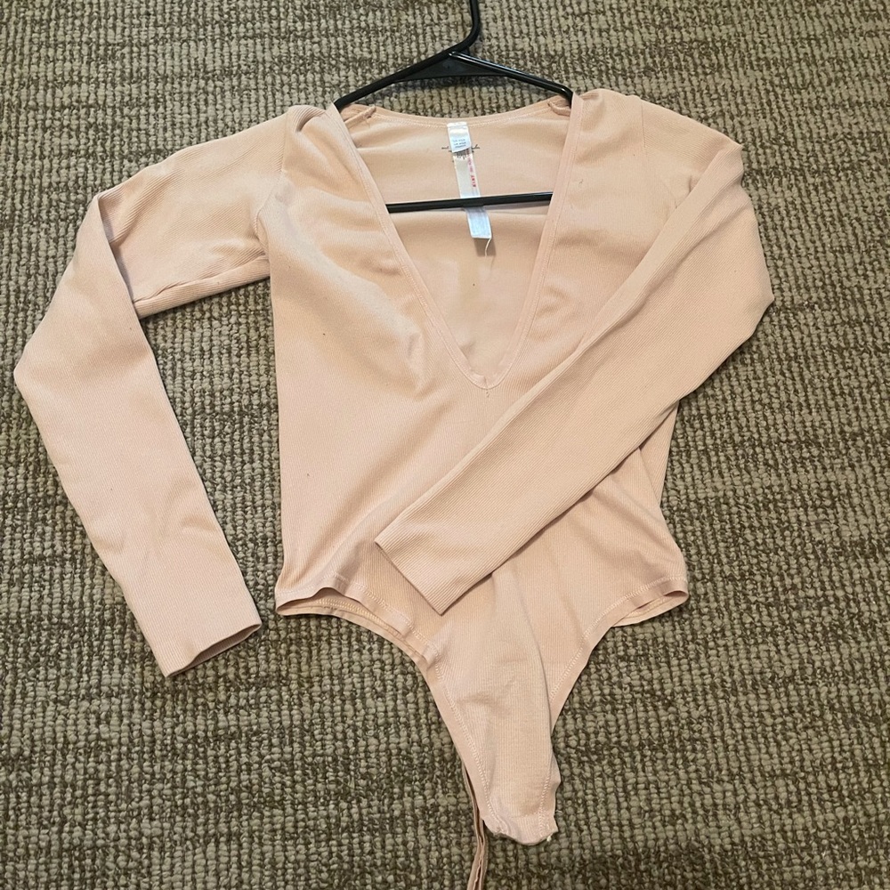 Out from under body suit